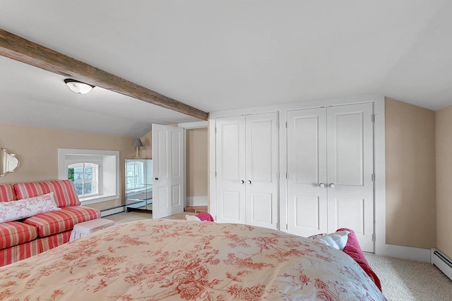 4105 Lime Kiln Rd, Green Bay, WI 54311 - bedroom with light colored carpet, a baseboard radiator, two closets, and baseboards