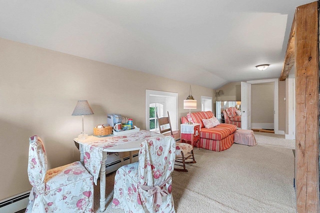 4105 Lime Kiln Rd, Green Bay, WI 54311 - dining room featuring a baseboard radiator, vaulted ceiling, and carpet floors