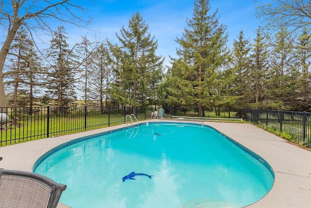 4105 Lime Kiln Rd, Green Bay, WI 54311 - view of swimming pool with view of scattered trees