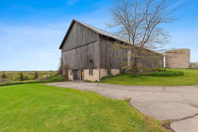 4105 Lime Kiln Rd, Green Bay, WI 54311 - view of barn with a lawn