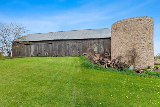 4105 Lime Kiln Rd, Green Bay, WI 54311 - view of green lawn with an outbuilding and a barn
