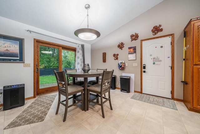 223 Willow Creek Rd, Rosendale, WI 54974 - dining room with vaulted ceiling and baseboards