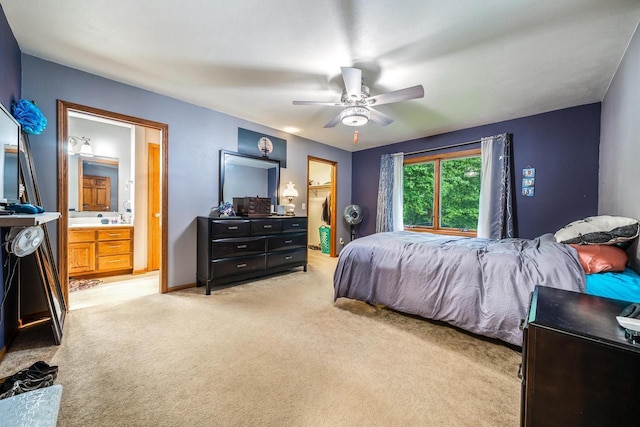 223 Willow Creek Rd, Rosendale, WI 54974 - bedroom featuring light colored carpet, a ceiling fan, ensuite bath, and baseboards