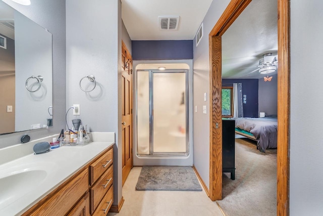 223 Willow Creek Rd, Rosendale, WI 54974 - ensuite bathroom with a stall shower, vanity, and ceiling fan
