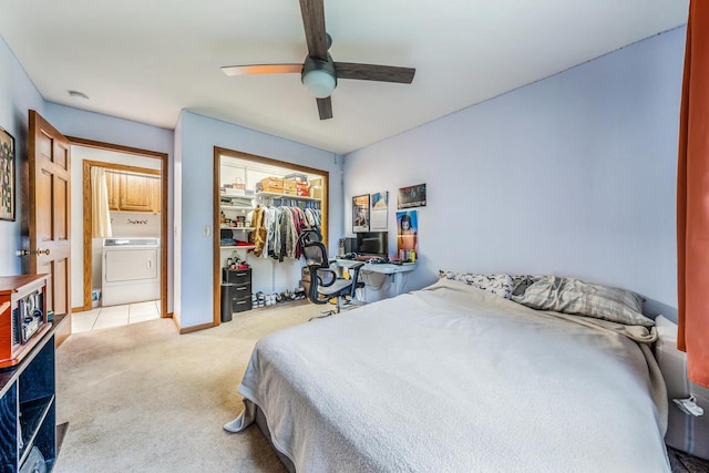 223 Willow Creek Rd, Rosendale, WI 54974 - bedroom with washer / clothes dryer, a closet, light carpet, and a ceiling fan