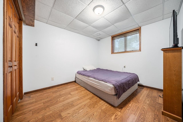 223 Willow Creek Rd, Rosendale, WI 54974 - bedroom featuring light wood finished floors, baseboards, and a paneled ceiling