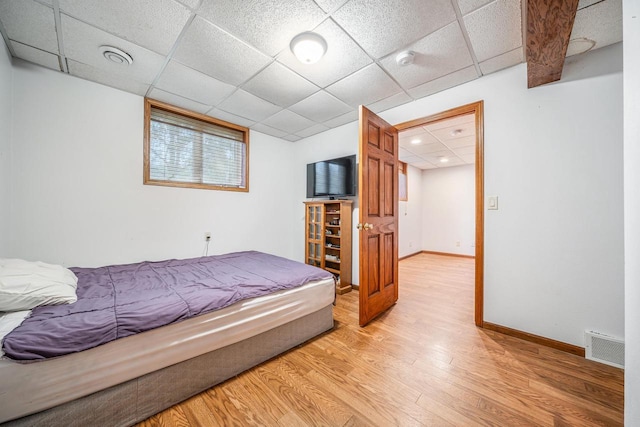 223 Willow Creek Rd, Rosendale, WI 54974 - bedroom with light wood finished floors, a paneled ceiling, baseboards, and recessed lighting