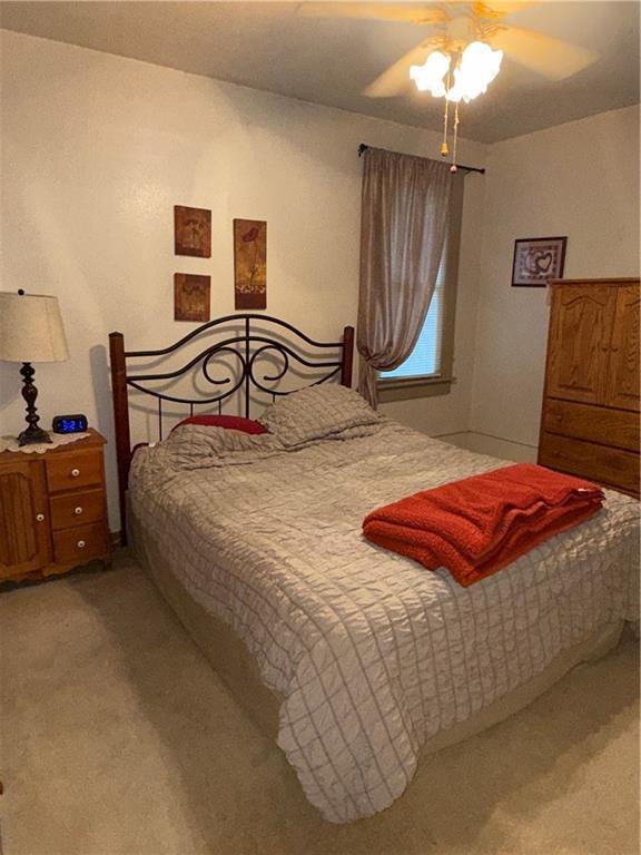 410-4101/2 W Elm St, Chippewa Falls, WI 54729 - bedroom featuring light colored carpet and a ceiling fan