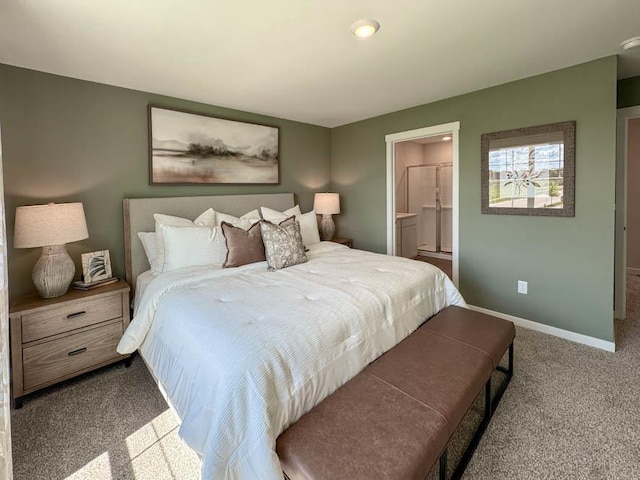 509 Oak Opening Dr, Stoughton, WI 53589 - carpeted bedroom featuring baseboards and ensuite bath