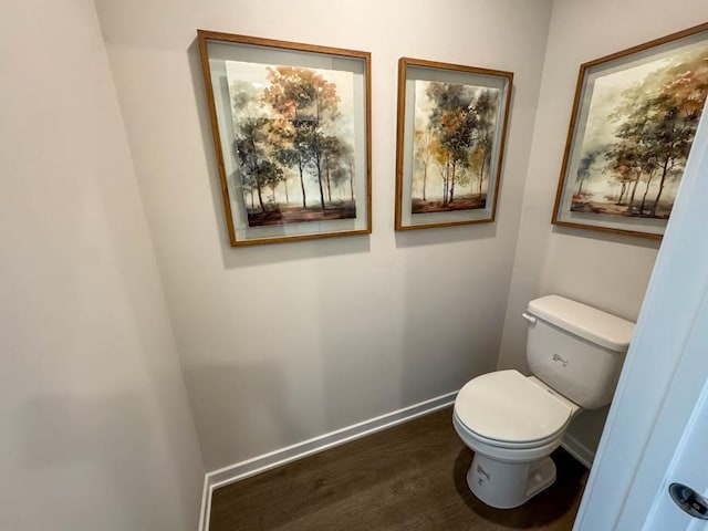 509 Oak Opening Dr, Stoughton, WI 53589 - bathroom featuring baseboards and toilet