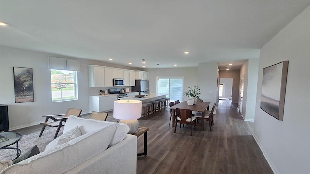 509 Oak Opening Dr, Stoughton, WI 53589 - living room with healthy amount of natural light, baseboards, dark wood finished floors, and recessed lighting