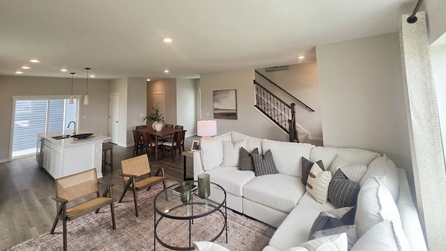 509 Oak Opening Dr, Stoughton, WI 53589 - living room with stairway, dark wood-type flooring, recessed lighting, and baseboards