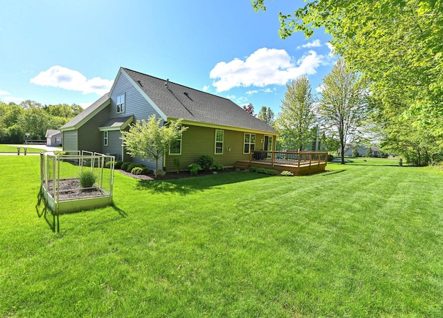 9165 S 47th St, Franklin, WI 53132 - rear view of house with a wooden deck, a lawn, and a shingled roof