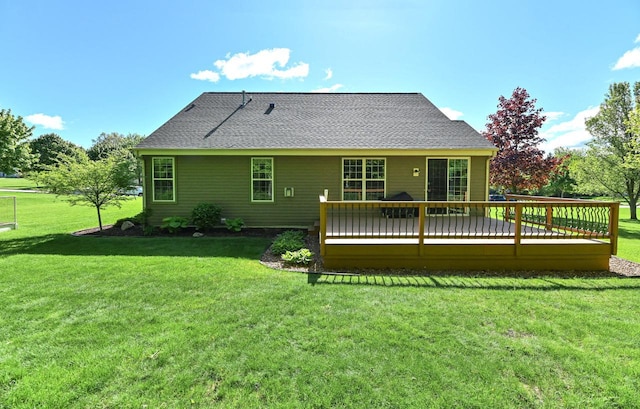 9165 S 47th St, Franklin, WI 53132 - back of house with a deck, a yard, and roof with shingles