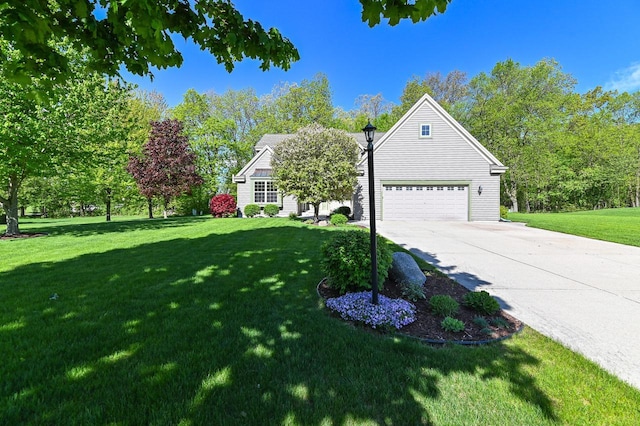 9165 S 47th St, Franklin, WI 53132 - view of front of house with driveway, a front yard, and a garage