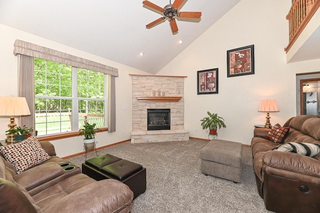 9165 S 47th St, Franklin, WI 53132 - living room featuring carpet flooring, a ceiling fan, high vaulted ceiling, baseboards, and a stone fireplace