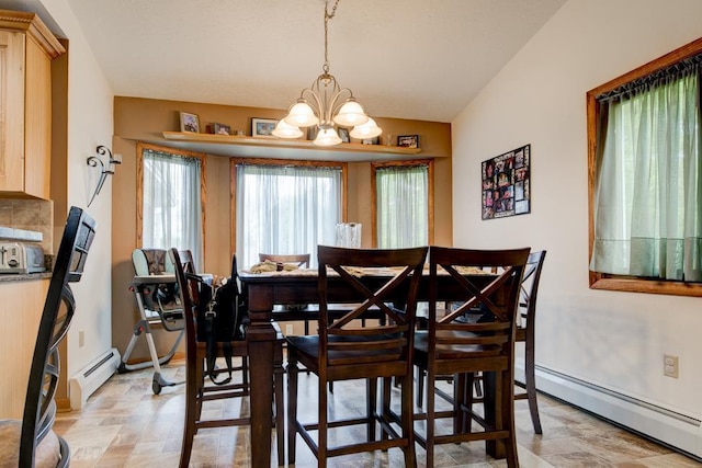 4100 15th St, Menominee, MI 49858 - dining room with a baseboard heating unit, stone finish flooring, a chandelier, and vaulted ceiling