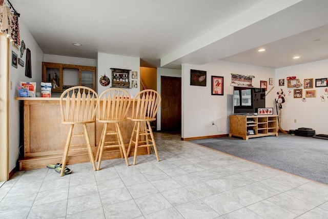 4100 15th St, Menominee, MI 49858 - dining space with a bar, recessed lighting, baseboards, and carpet