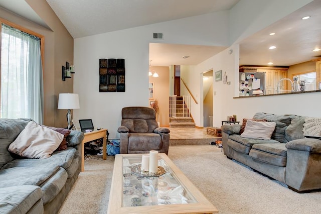 4100 15th St, Menominee, MI 49858 - living room with carpet flooring, lofted ceiling, stairs, and recessed lighting