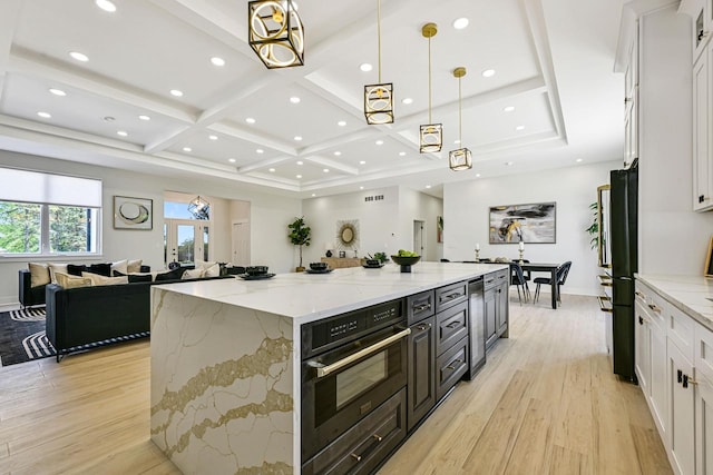 10500 W Vera Ave, Milwaukee, WI 53224 - kitchen with black appliances, coffered ceiling, white cabinets, light wood finished floors, and open floor plan