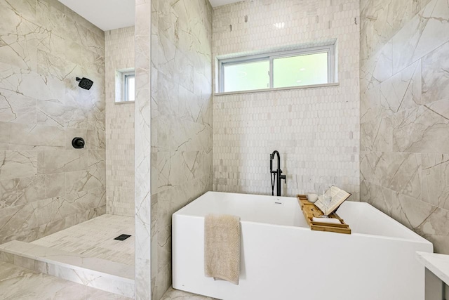 10500 W Vera Ave, Milwaukee, WI 53224 - bathroom with healthy amount of natural light, tile walls, tiled shower, and a soaking tub
