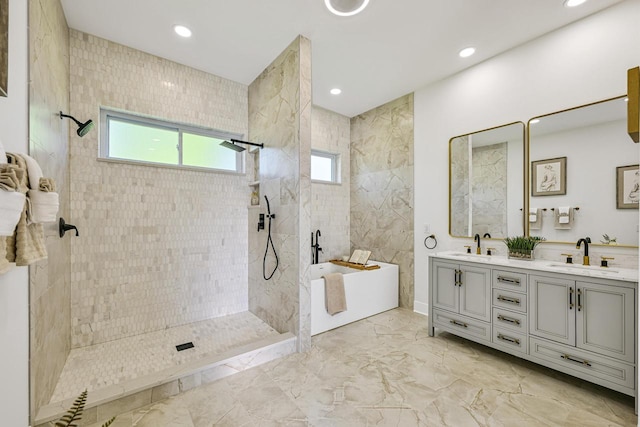 10500 W Vera Ave, Milwaukee, WI 53224 - bathroom with double vanity, a walk in shower, a freestanding tub, marble finish flooring, and recessed lighting