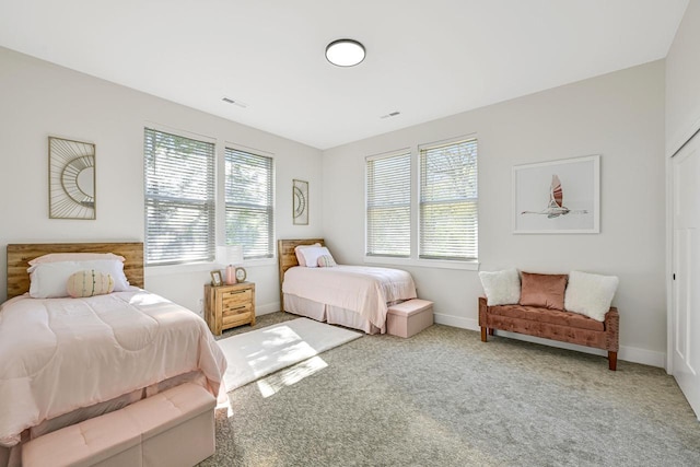 10500 W Vera Ave, Milwaukee, WI 53224 - bedroom with carpet flooring and baseboards