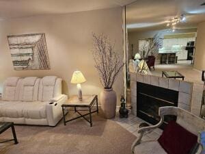 35 Harborview Dr Unit 108, Racine, WI 53403 - carpeted living room featuring a fireplace