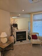 35 Harborview Dr Unit 108, Racine, WI 53403 - living area with a glass covered fireplace
