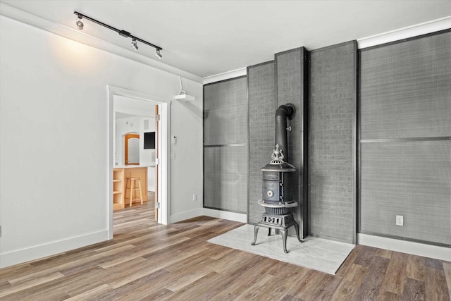 6600 N Ballard Rd, Appleton, WI 54913 - living area with rail lighting, wood finished floors, and baseboards