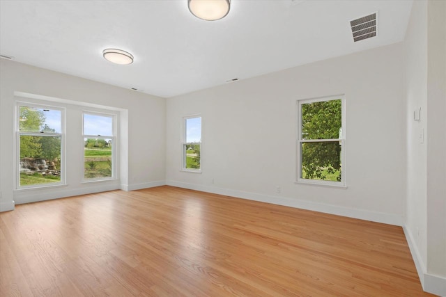 6600 N Ballard Rd, Appleton, WI 54913 - spare room featuring light wood-style floors and baseboards