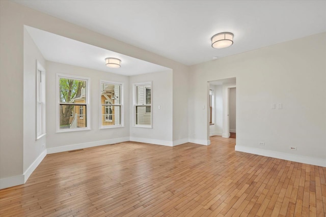 6600 N Ballard Rd, Appleton, WI 54913 - empty room featuring light wood-type flooring and baseboards