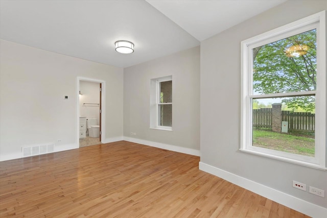 6600 N Ballard Rd, Appleton, WI 54913 - spare room with baseboards and light wood-type flooring