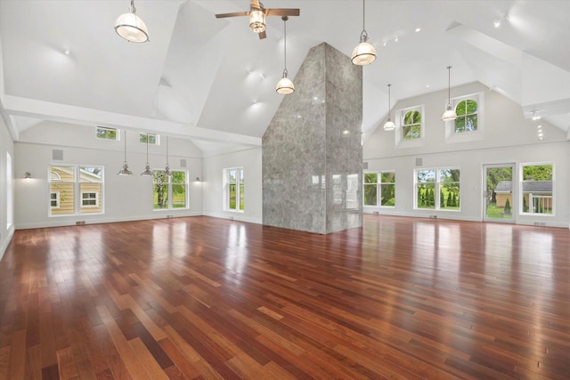 6600 N Ballard Rd, Appleton, WI 54913 - unfurnished living room with high vaulted ceiling, a ceiling fan, healthy amount of natural light, wood-type flooring, and baseboards