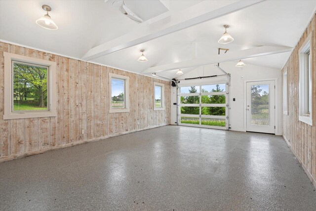 6600 N Ballard Rd, Appleton, WI 54913 - empty room with plenty of natural light and wood walls
