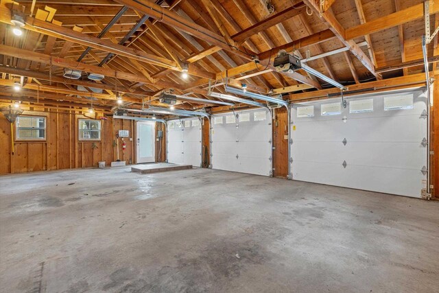 6600 N Ballard Rd, Appleton, WI 54913 - garage featuring a garage door opener