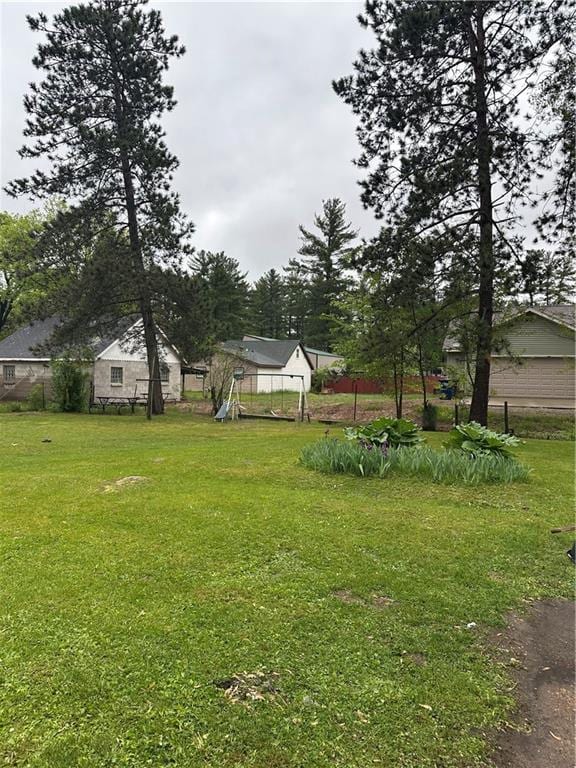 315 Armstrong Ave, Black River Falls, WI 54615 - view of grassy yard