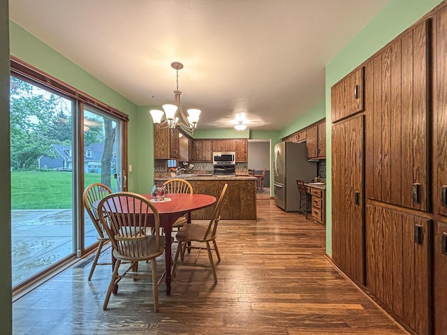 21755 W N Ave, Brookfield, WI 53045 - dining room with a chandelier and dark wood-type flooring