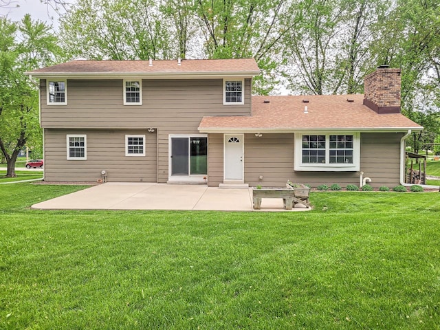 21755 W N Ave, Brookfield, WI 53045 - rear view of house with a patio, a chimney, a yard, and a shingled roof