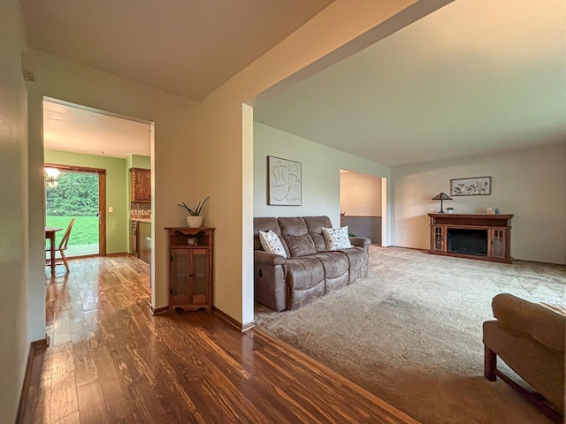 21755 W N Ave, Brookfield, WI 53045 - living area with wood finished floors, a fireplace, and baseboards