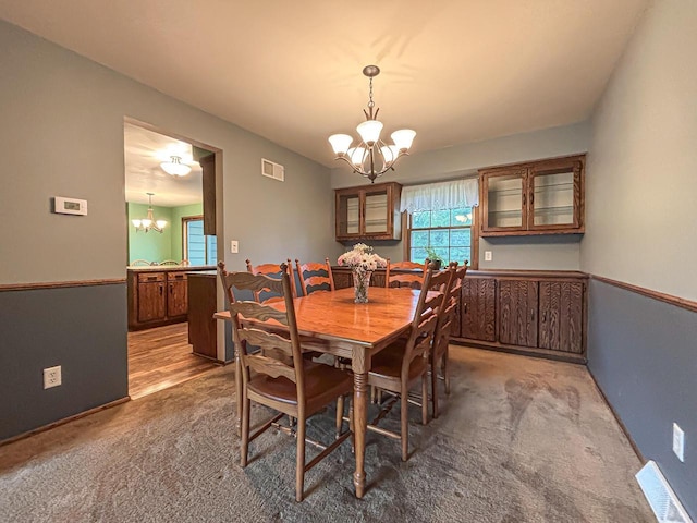 21755 W N Ave, Brookfield, WI 53045 - dining area featuring a chandelier and carpet floors