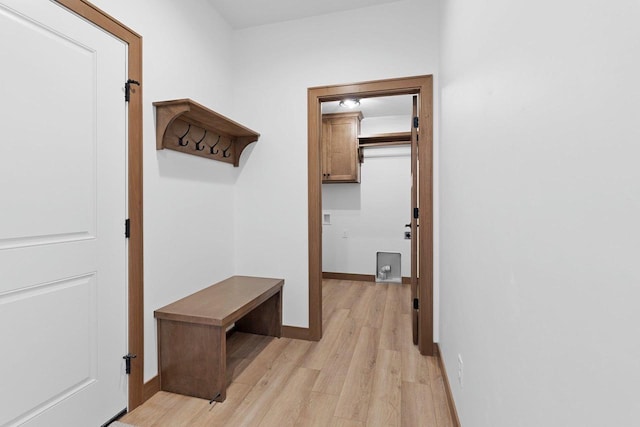 513 Kirkland Ave, Algoma, WI 54201 - mudroom with light wood-type flooring and baseboards