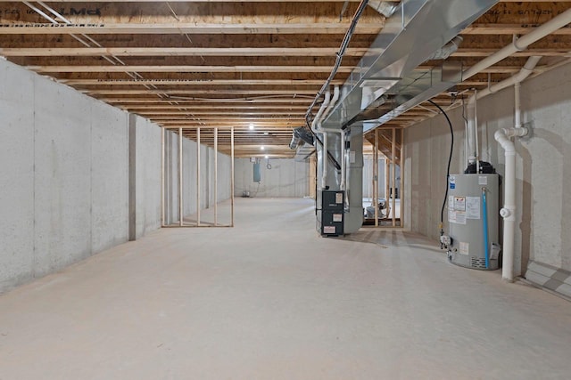 513 Kirkland Ave, Algoma, WI 54201 - unfinished basement with water heater and heating unit