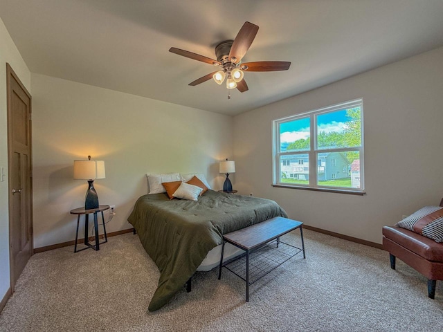 990 Morning Star Ln, Plover, WI 54467 - bedroom with light carpet, baseboards, and a ceiling fan
