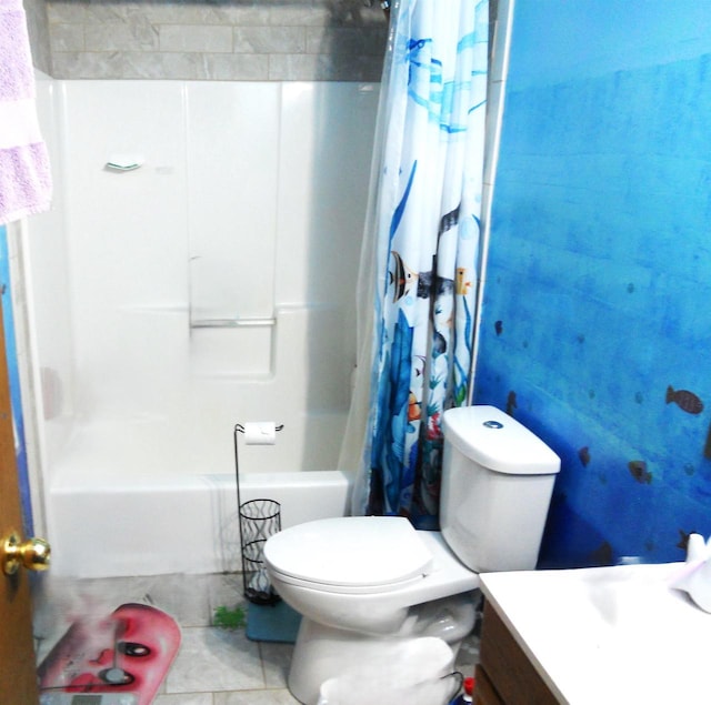 1129 Ember Dr, Adams, WI 53910 - bathroom with vanity, shower / tub combo, toilet, and tile patterned flooring