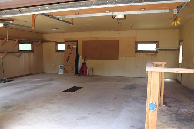 620 Oak St, Winneconne, WI 54986 - garage featuring a garage door opener