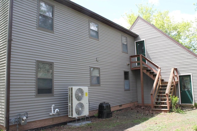 620 Oak St, Winneconne, WI 54986 - rear view of house with stairs, crawl space, and ac unit