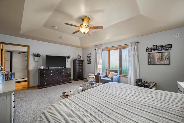 S91W35161 Prairie Ct, Eagle, WI 53119 - bedroom featuring a raised ceiling, light colored carpet, baseboard heating, and ceiling fan