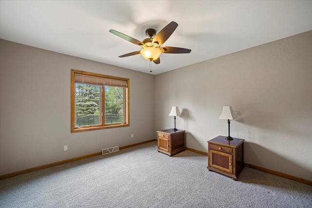 S91W35161 Prairie Ct, Eagle, WI 53119 - unfurnished bedroom with light colored carpet, baseboards, and ceiling fan