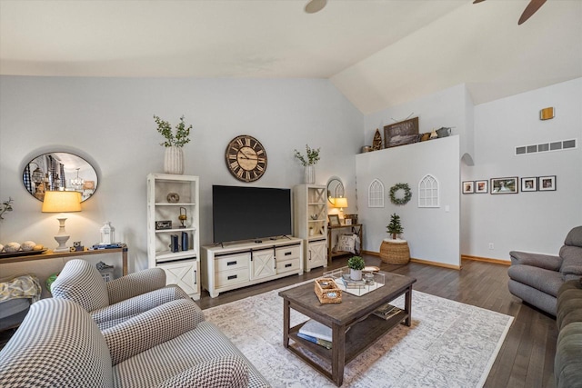 S91W35161 Prairie Ct, Eagle, WI 53119 - living room with wood finished floors, a ceiling fan, vaulted ceiling, arched walkways, and baseboards
